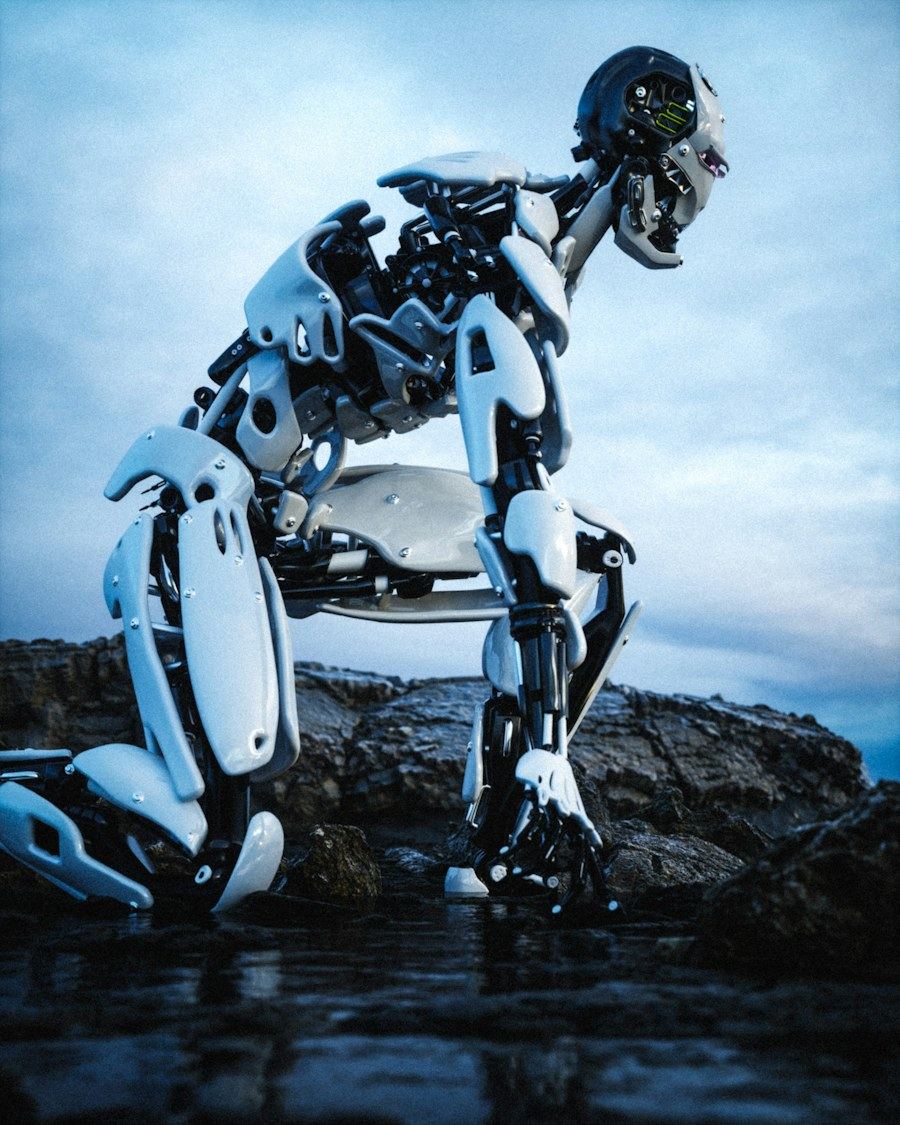 Black and white humanoid robot crouching on rocks at the water's edge
