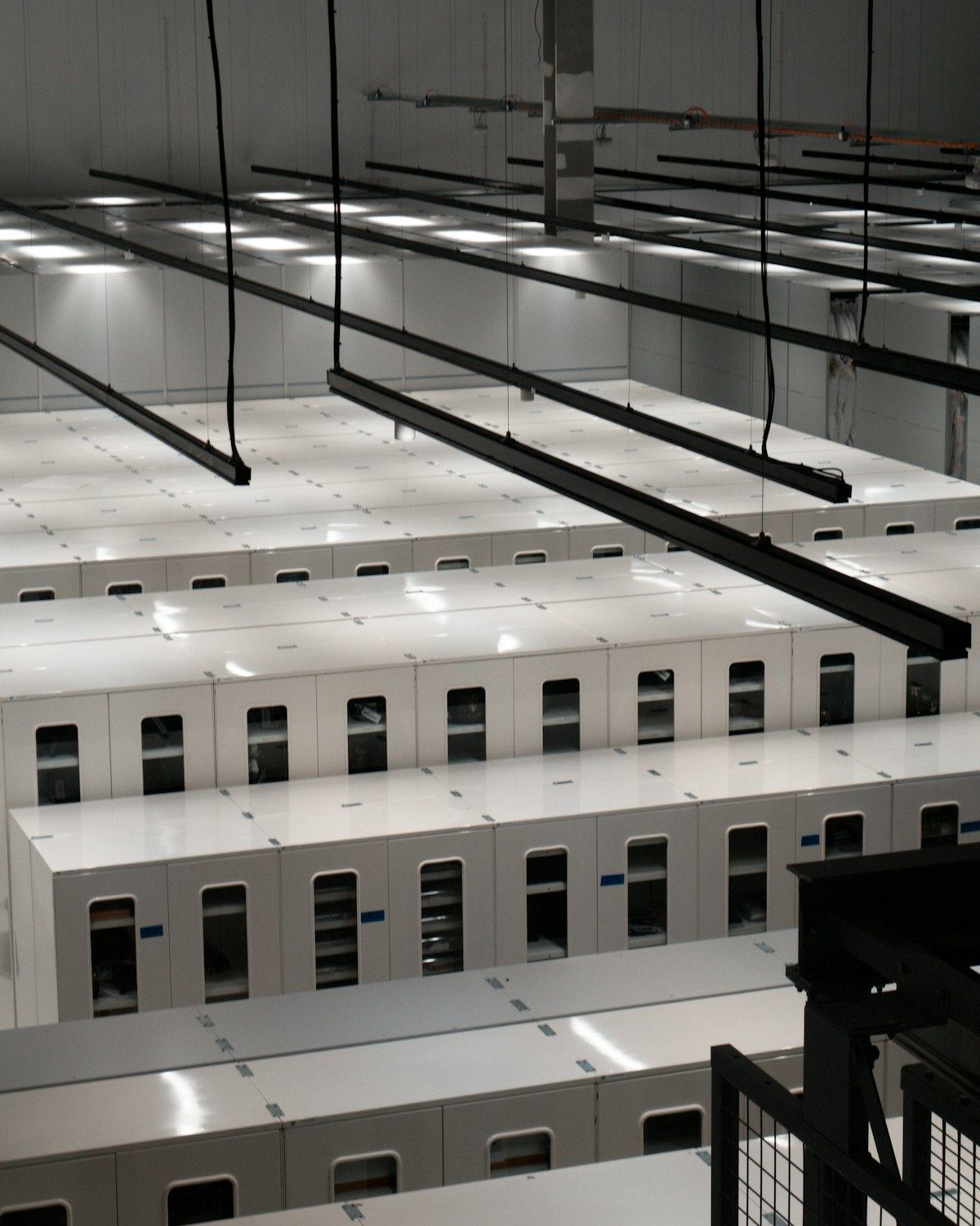 Rows of server cabinets in a modern data hall